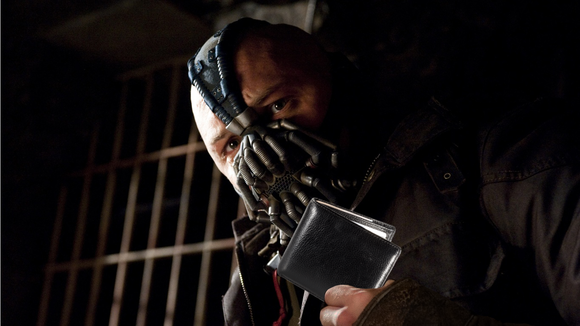 Bane looks silly holding a wallet