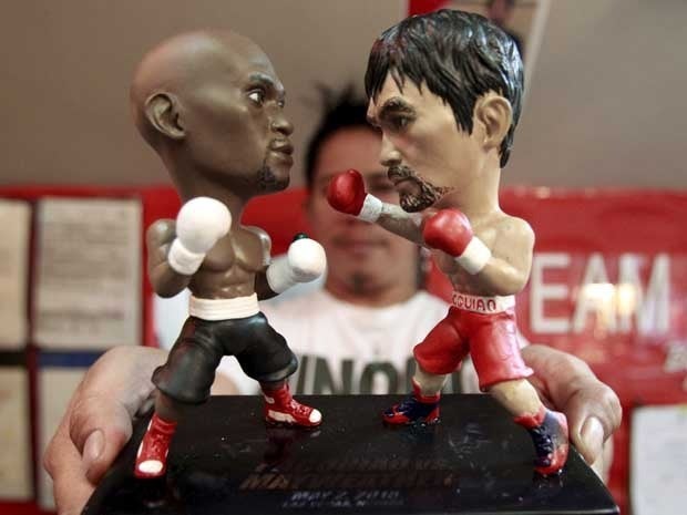 Miniature figurines of boxers Floyd Mayweather Jr. and Manny Pacquiao