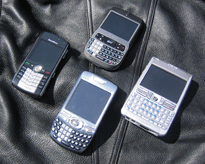 image of a RIM BlackBerry Pearl, Nokia E62, Palm Treo 750 and T-Mobile HTC Dash