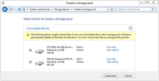 Windows 8's Storage Spaces automagically combines multiple disks into one