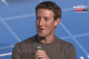 zuckerberg smiles mwc