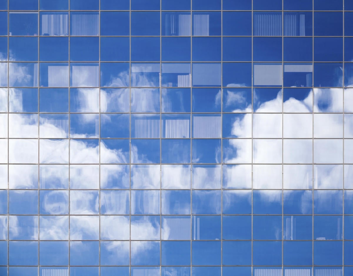 Abstract background texture with bright clouds in windows