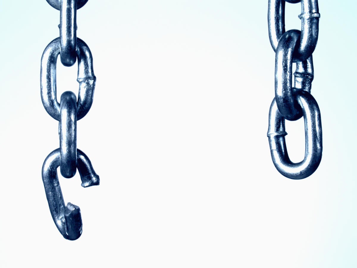 steel chain with broken link close up 55909938