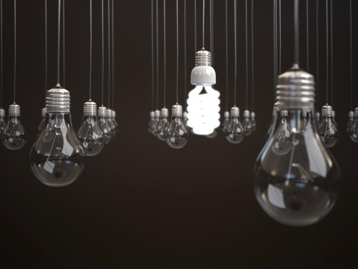 Energy saving light bulbs hanging