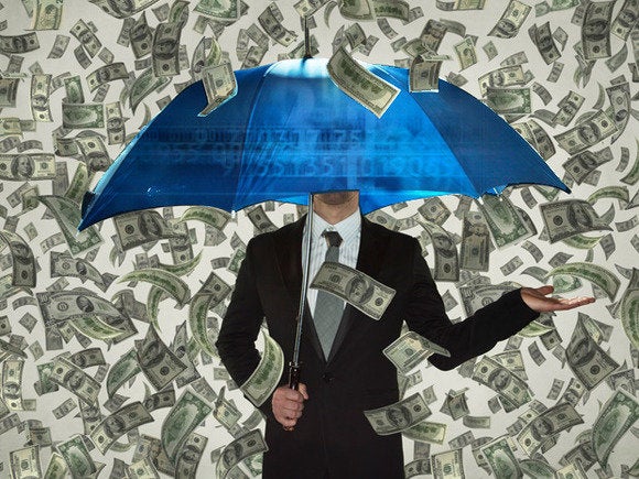 Man under umbrella raining money