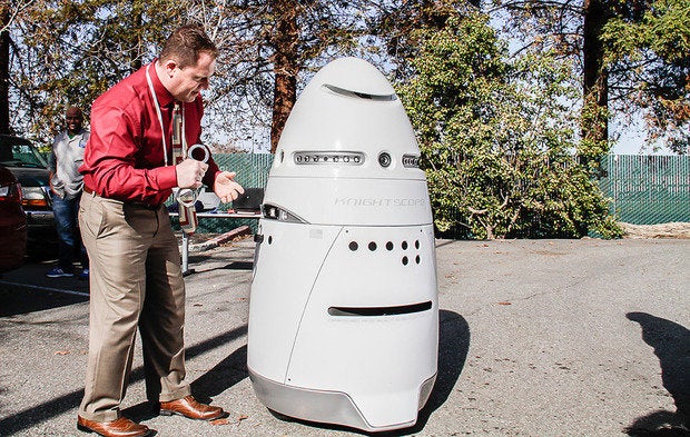 Knightscope K5 Robot With Man