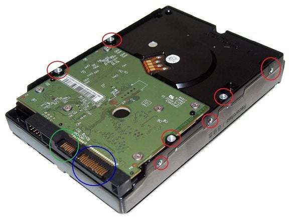 upside down hard drive showing screw holes