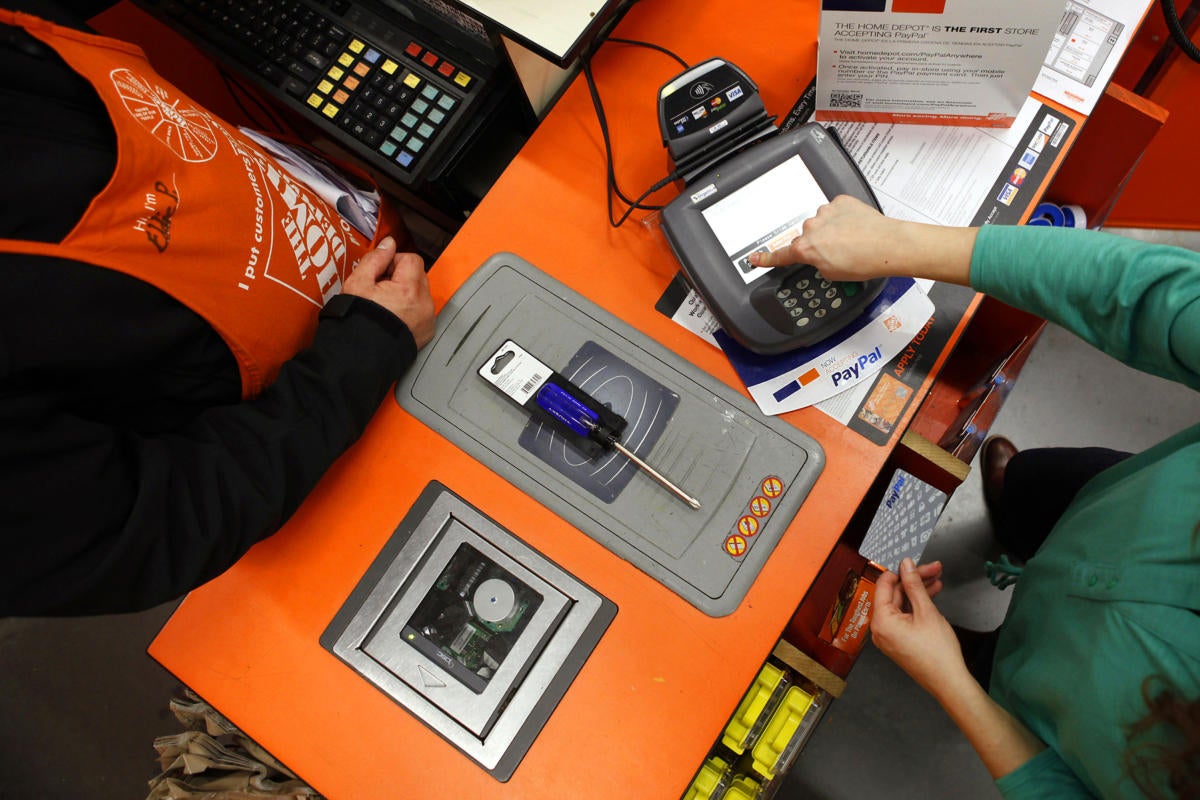 Checking out at the Home Depot cash register.