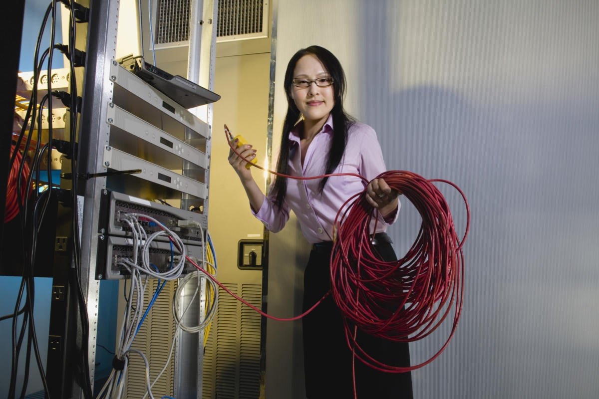 female worker server room data center