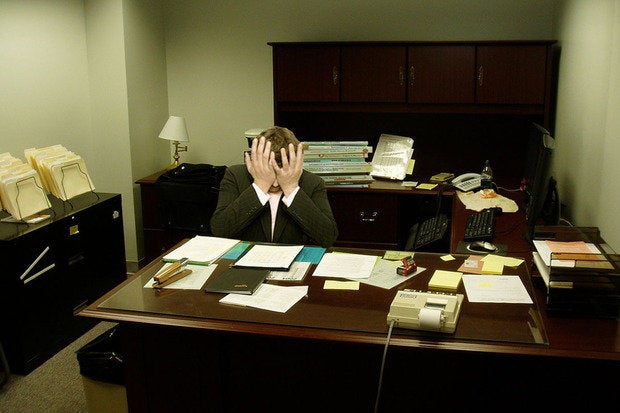frustrated man at a desk