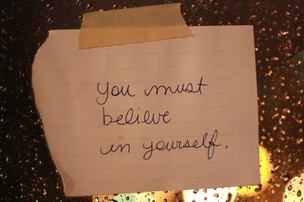 A handwritten sign that says You must believe in yourself.