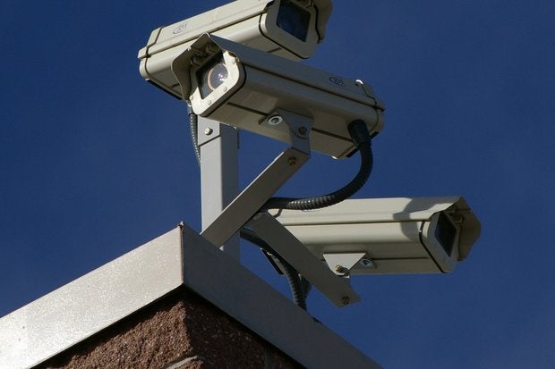 three surveillance cameras