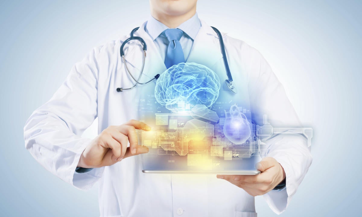 Doctor in holding tablet with medical images floating out of it