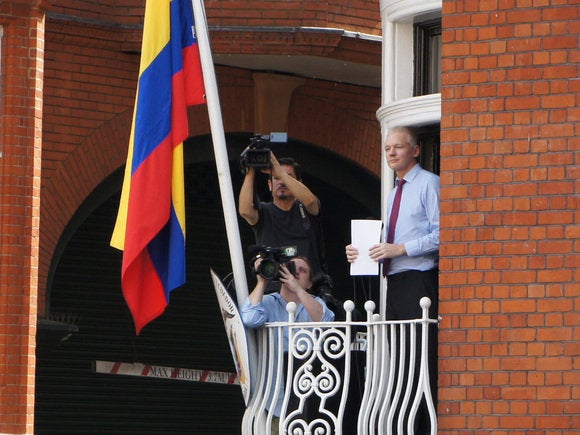 assange on balcony