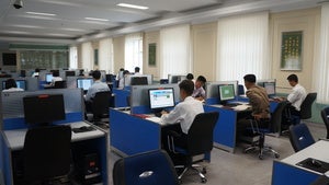 Students use computers at Kim Il Sung University, North Korea