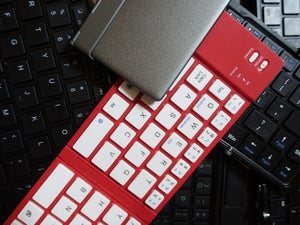 Folding Keyboards Stacked On One Another