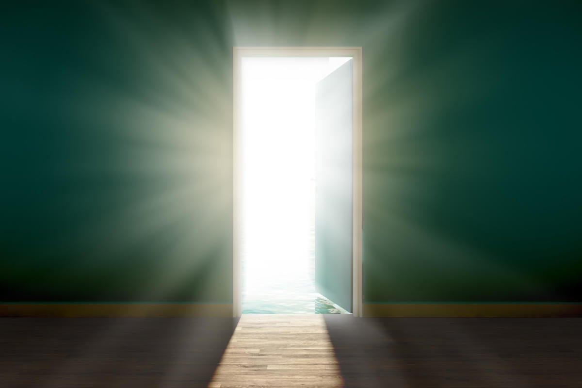 open door with sunlight shining through