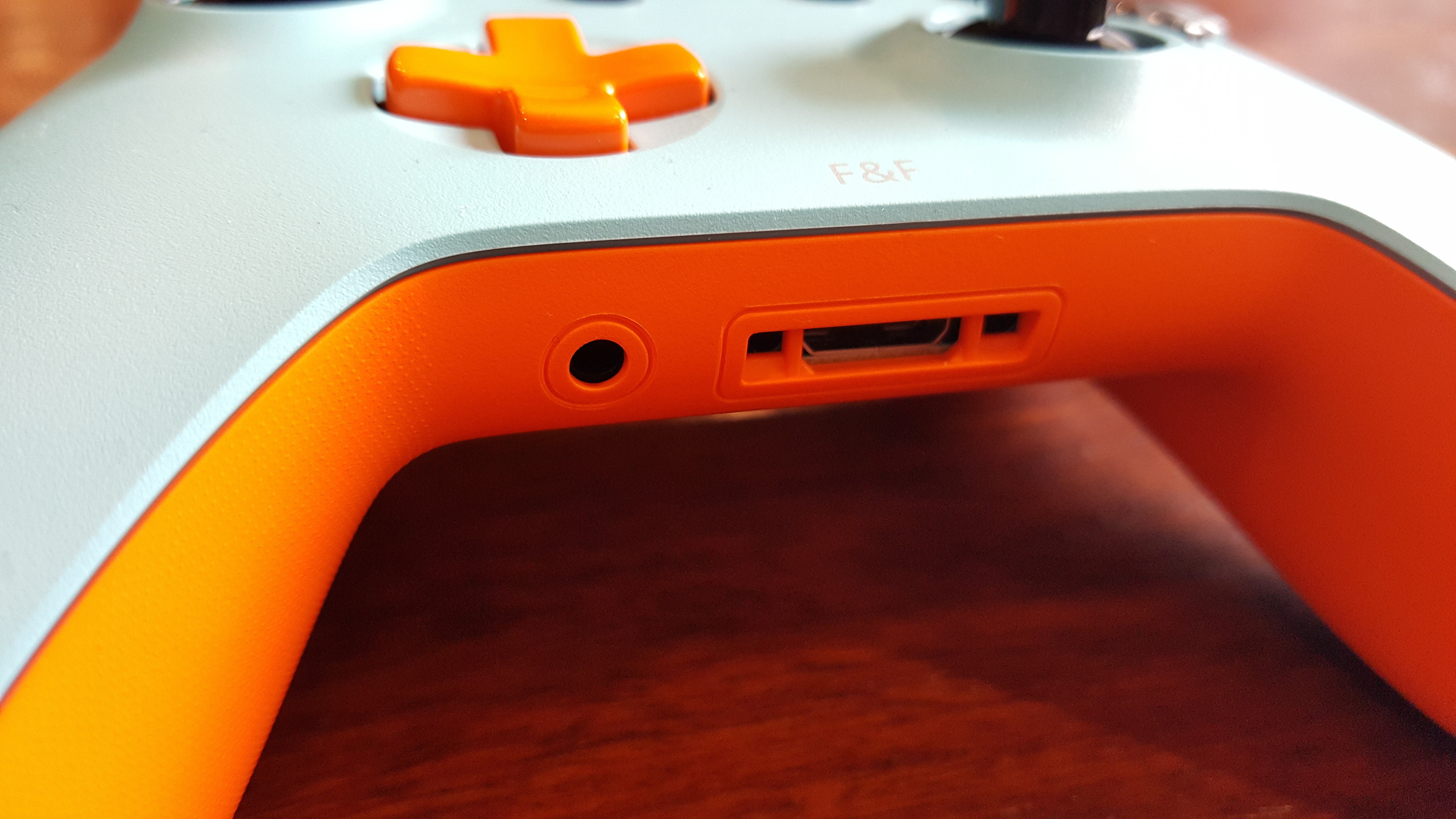 orange and white xbox one controller