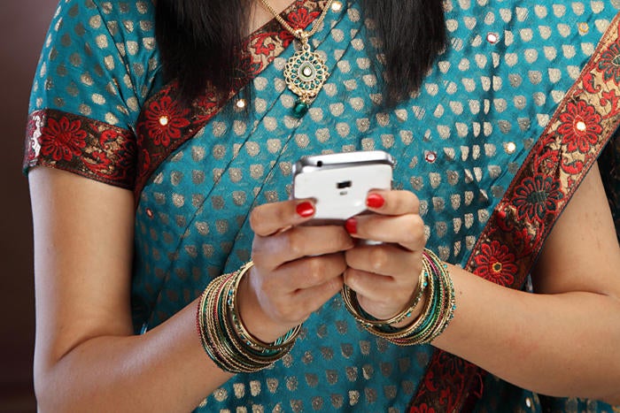 indian woman texting