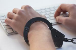 Employee handcuffed to keyboard