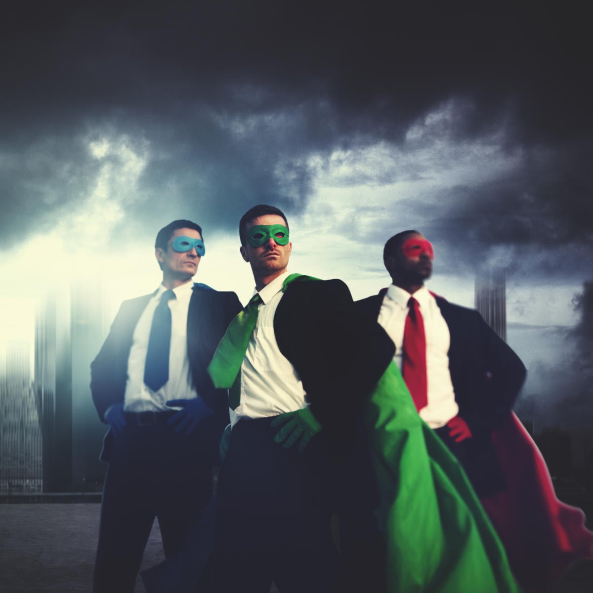 3 colorful superhero executives against cloudy sky