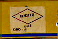 A sharpened image shows more clearly the word Thacker and initials U.A.E. written on one of the boxes at the IHPCRC.