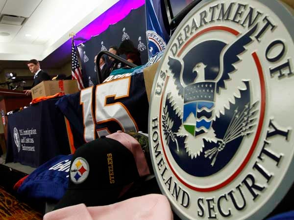 Law enforcement crack down on counterfeit Super Bowl merchandise