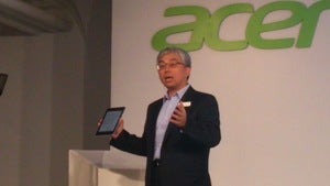 Acer chairman Jim Wong showing the $169 Iconia A1 Android tablet